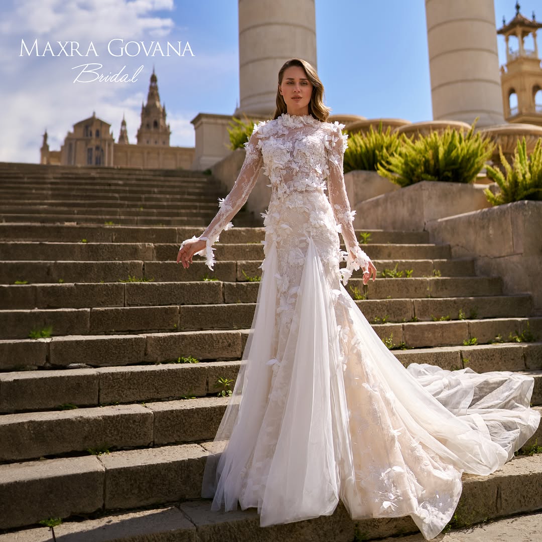 Abito da sposa Maxra Gova dal design sofisticato con applicazioni eleganti.