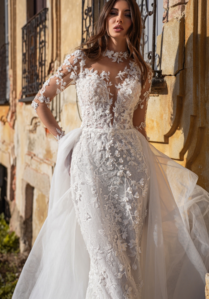 Abito da sposa Dovita Milano con tessuti raffinati e dettagli sartoriali esclusivi.